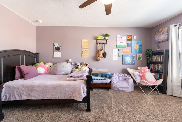 carpeted bedroom featuring a ceiling fan