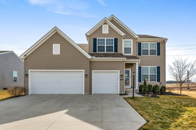 view of front of home featuring a garage, a front yard, and concrete driveway