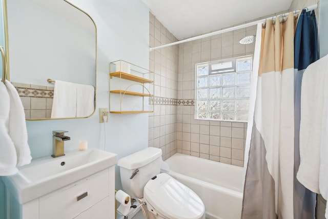 full bath featuring vanity, toilet, and shower / tub combo with curtain