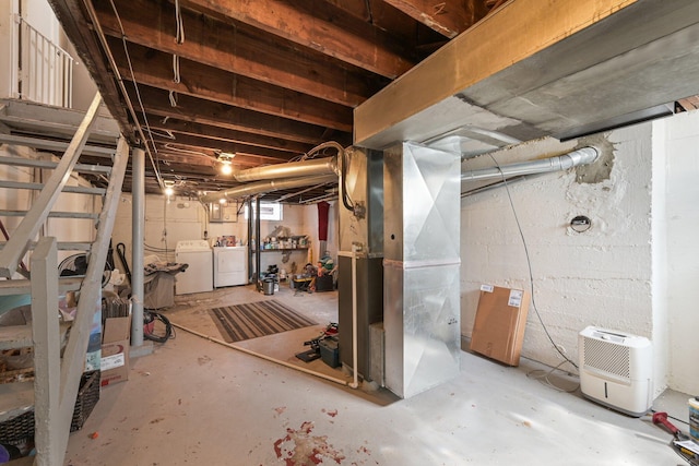 unfinished basement with washer and dryer