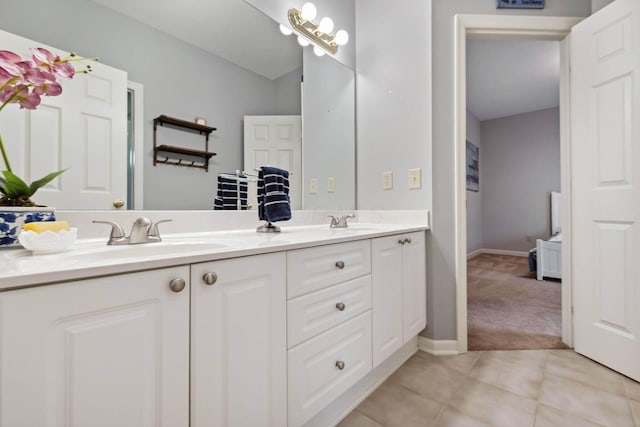 bathroom with vanity and tile patterned flooring