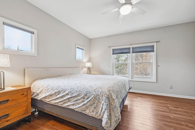 bedroom featuring dark hardwood / wood-style flooring and ceiling fan