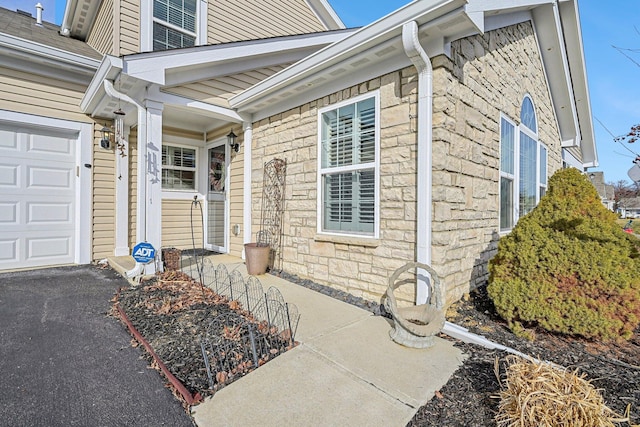 property entrance featuring a garage