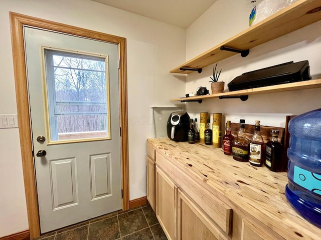 doorway to outside with bar area