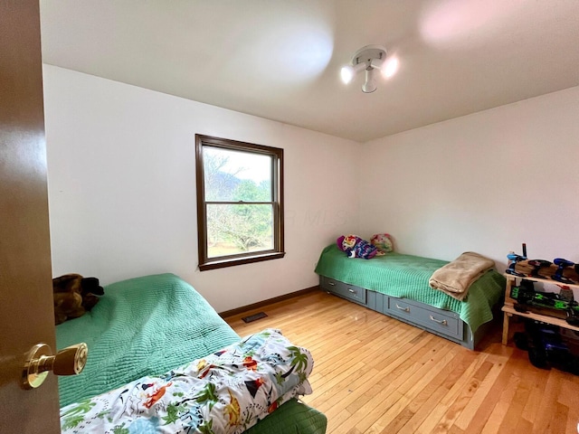 bedroom featuring light hardwood / wood-style flooring