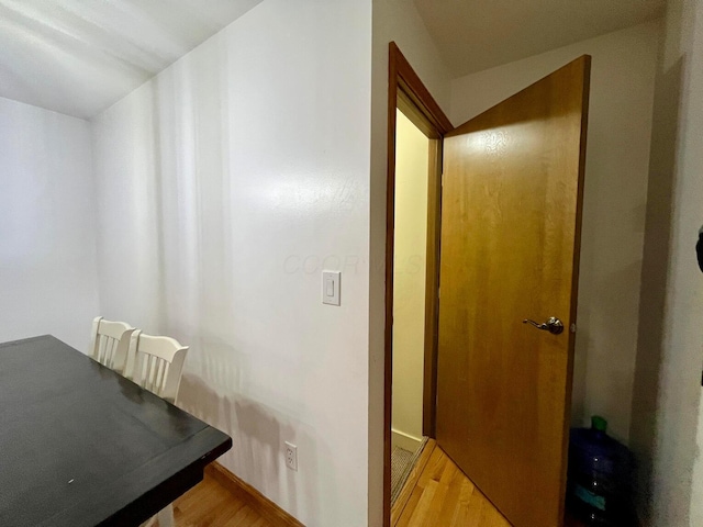 office area with light hardwood / wood-style floors