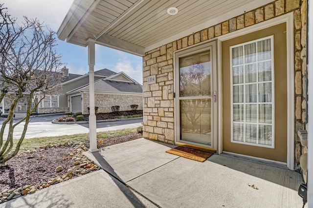 doorway to property with covered porch