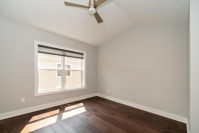 unfurnished room featuring dark wood-type flooring, ceiling fan, and lofted ceiling