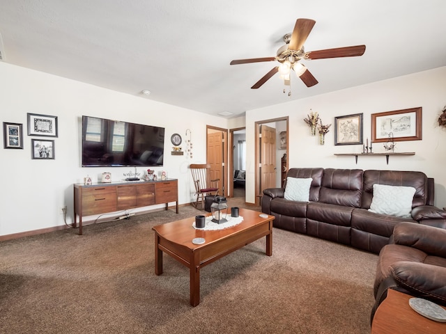 living room featuring ceiling fan and carpet flooring