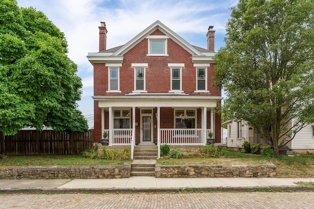 view of front of home featuring covered porch