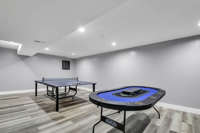 playroom with light hardwood / wood-style floors