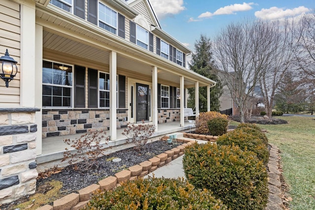 entrance to property with covered porch