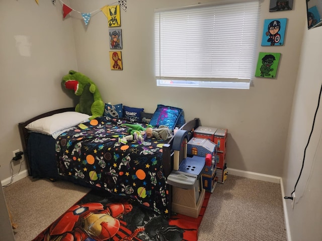 bedroom featuring carpet