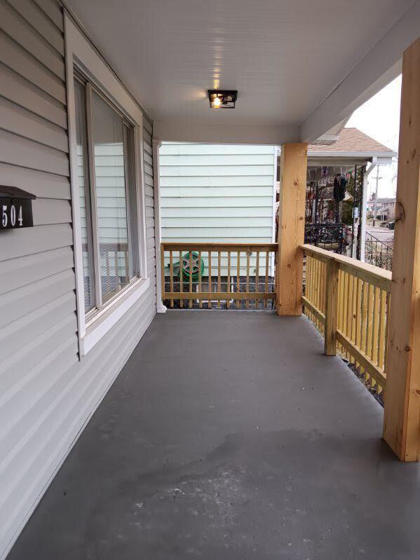 balcony featuring a porch