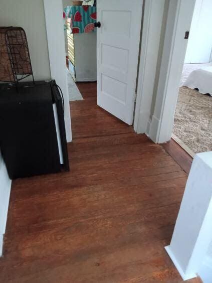 hall featuring dark hardwood / wood-style flooring