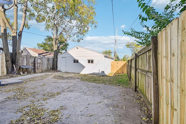 exterior space with a shed