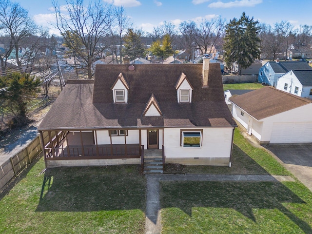 view of front of home featuring a front yard, a residential view, and a chimney