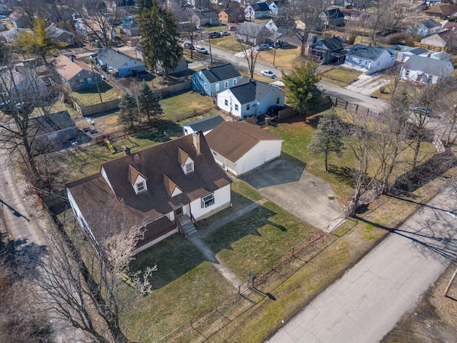 birds eye view of property with a residential view