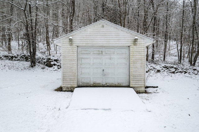 view of snow covered garage