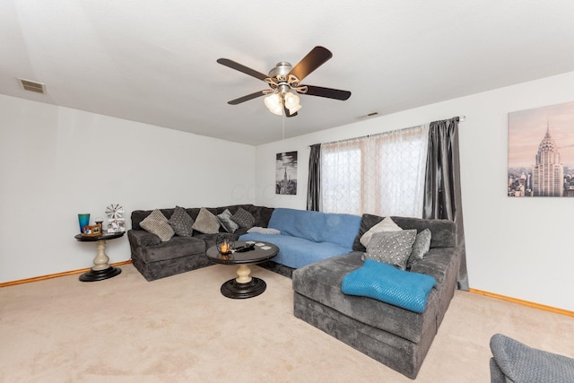 living room with light carpet and ceiling fan