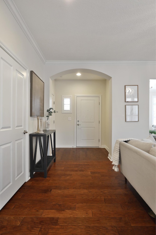 hallway featuring ornamental molding and dark wood-type flooring