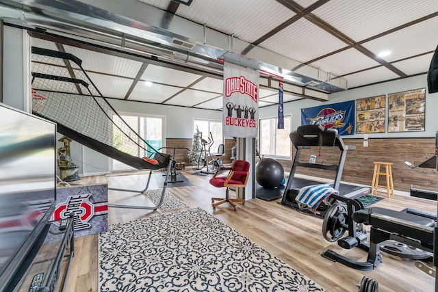 workout area featuring wood finished floors