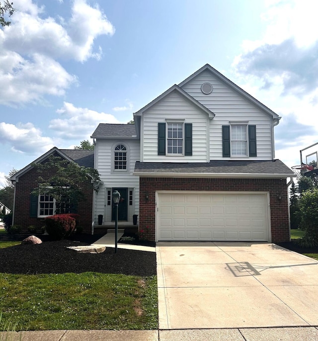 6707 Sunningdale Dr, Westerville, OH 43082 - traditional-style house featuring brick siding, an attached garage, concrete driveway, and a shingled roof