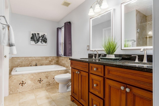 full bath with double vanity, a sink, visible vents, and tile patterned floors