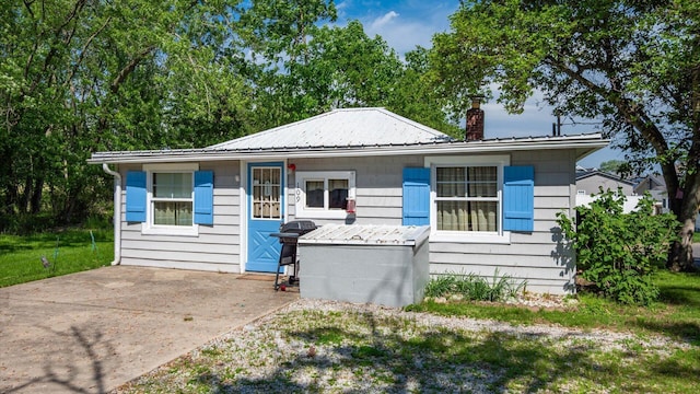 109 Beacon Light Ln, Buckeye Lake, OH 43008 - bungalow-style home featuring metal roof and a chimney
