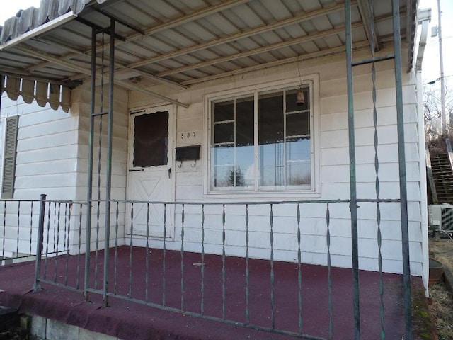 view of side of property featuring central AC unit