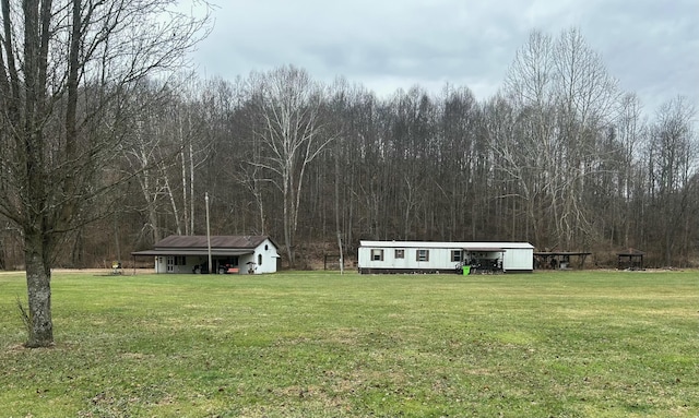 view of yard featuring a carport