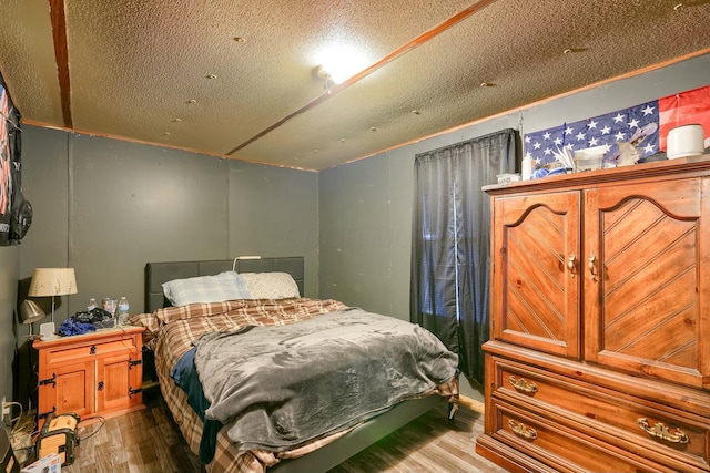 bedroom with light hardwood / wood-style floors