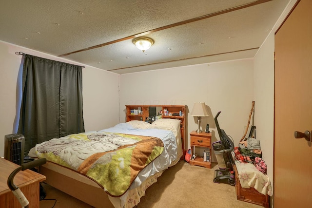 carpeted bedroom with a textured ceiling