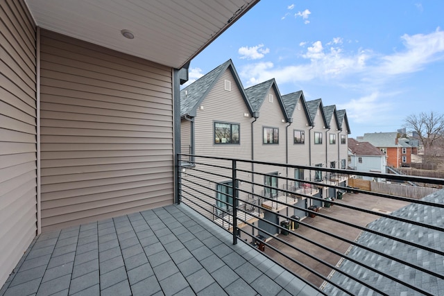 balcony featuring a residential view