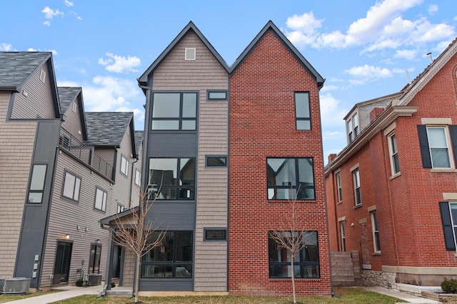 exterior space featuring central AC unit