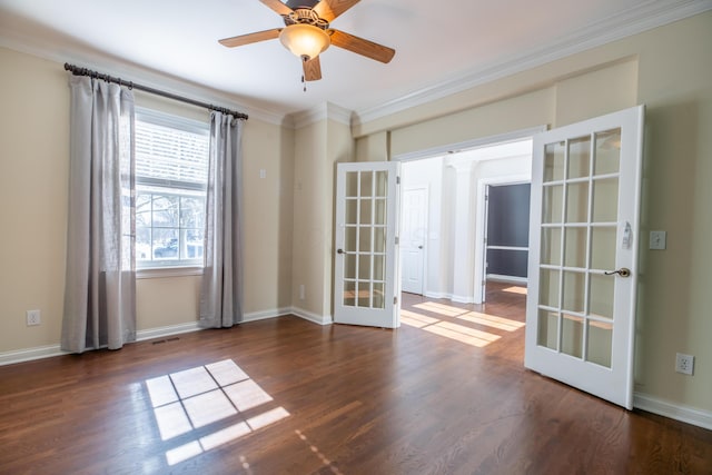 unfurnished room featuring ornamental molding, french doors, dark hardwood / wood-style floors, and ceiling fan