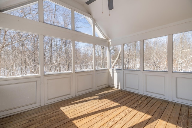 unfurnished sunroom with vaulted ceiling and ceiling fan