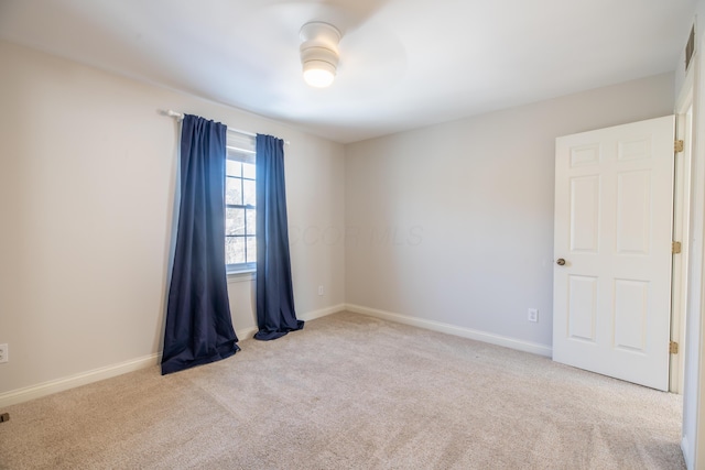 view of carpeted spare room