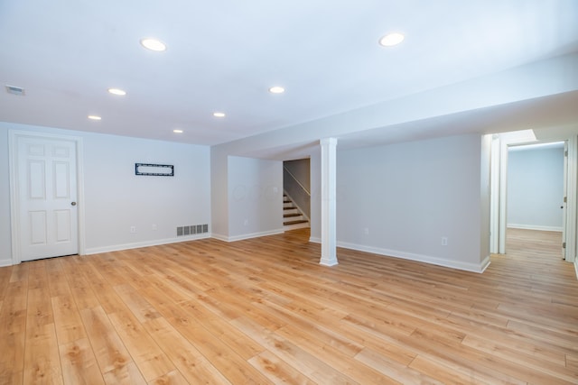 basement featuring light hardwood / wood-style flooring