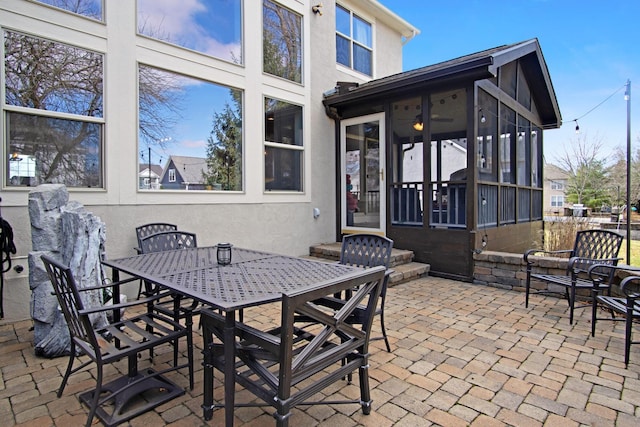 6268 Bellow Valley Dr, Dublin, OH 43016 - view of patio featuring outdoor dining space and a sunroom