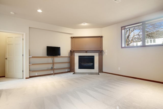 6268 Bellow Valley Dr, Dublin, OH 43016 - unfurnished living room featuring recessed lighting, baseboards, light carpet, and a fireplace