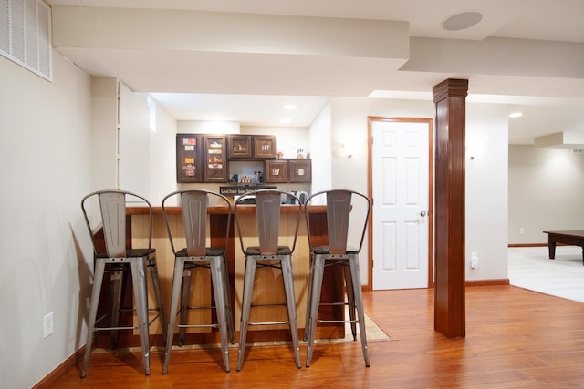 6268 Bellow Valley Dr, Dublin, OH 43016 - bar featuring visible vents, baseboards, indoor bar, recessed lighting, and wood finished floors