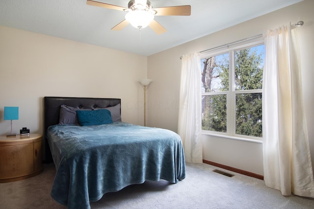 6268 Bellow Valley Dr, Dublin, OH 43016 - carpeted bedroom featuring baseboards, visible vents, and ceiling fan