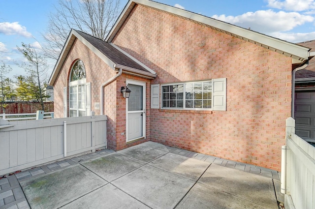 rear view of house with a patio