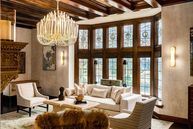 interior space featuring an inviting chandelier, ornamental molding, hardwood / wood-style flooring, beam ceiling, and a high ceiling