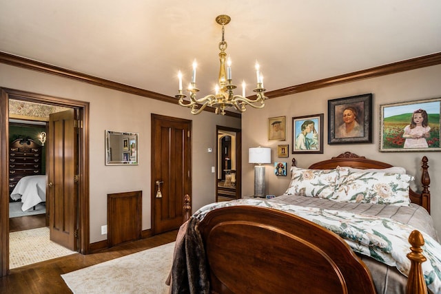 bedroom with crown molding, dark hardwood / wood-style floors, and an inviting chandelier