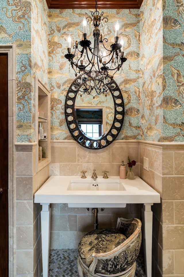 bathroom with sink and tile walls