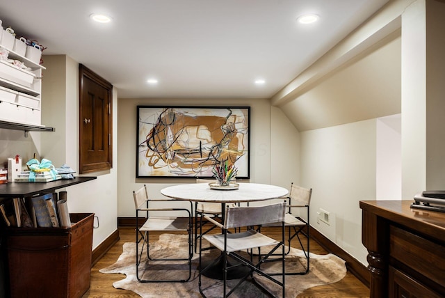 dining room with dark hardwood / wood-style floors