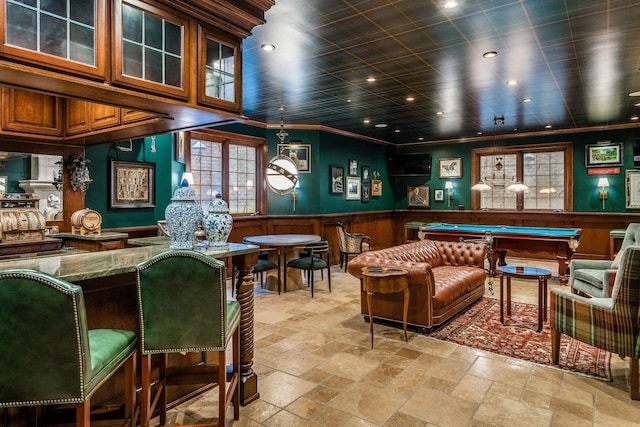 interior space with crown molding, pool table, and indoor bar