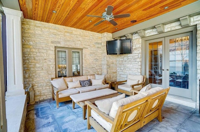 view of patio / terrace featuring an outdoor hangout area, ceiling fan, and french doors